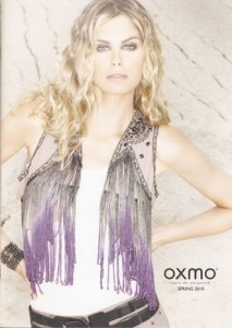 Bolero er en helt kort jakke enten med lange ærmer, 3/4 lange  eller korte ærmer eller her som vest fra Oxmo